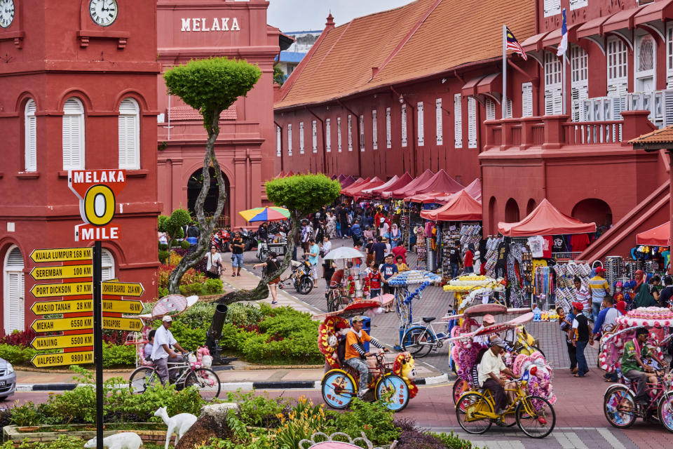 The city square of Malacca in Malaysia, filled with tourists and visitors during its peak hour.