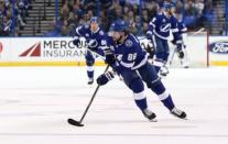 Mar 26, 2018; Tampa, FL, USA; Tampa Bay Lightning right wing Nikita Kucherov (86) skates with the puck against the Arizona Coyotes during the first period at Amalie Arena. Mandatory Credit: Kim Klement-USA TODAY Sports