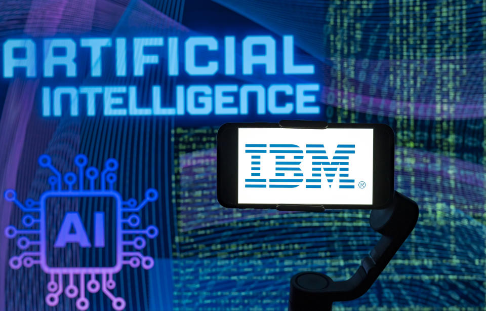 INDIA - 2023/12/02: In this photo illustration, the logo of IBM is seen displayed on a mobile phone screen with AI (artificial intelligence) written in the background. (Photo Illustration by Idrees Abbas/SOPA Images/LightRocket via Getty Images)