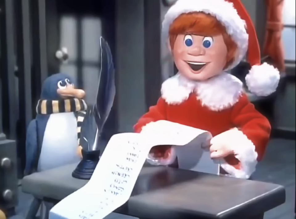 Santa's elf going over a list