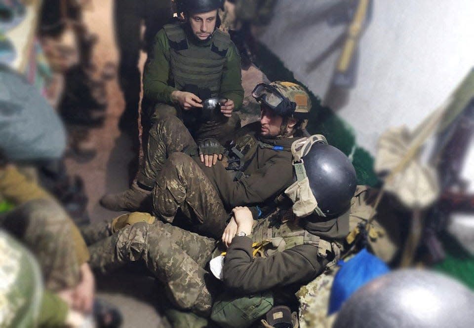 This undated handout picture released by the Ukrainian President Administration press-service shows Ukrainian fighters at the Azovstal steelworks of Ukrainian city of Mariupol.