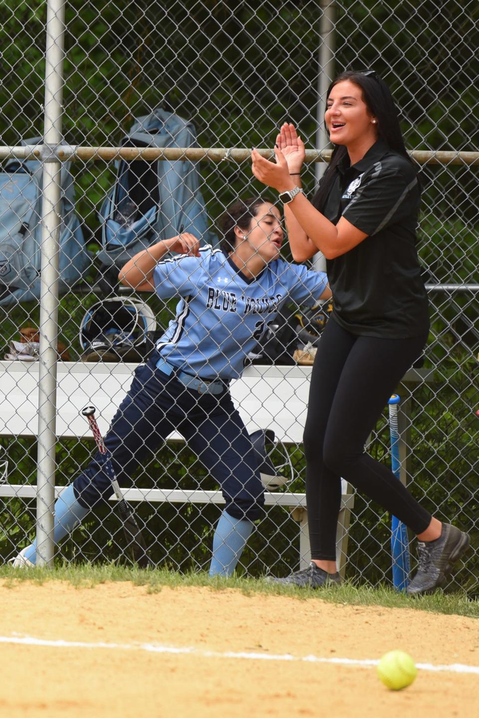Immaculate Conception's softball team is coached by alum Sarah Piening, seen here cheering her team on during the NJSIAA Non-Public B softball semifinal against Morris Catholic last May.