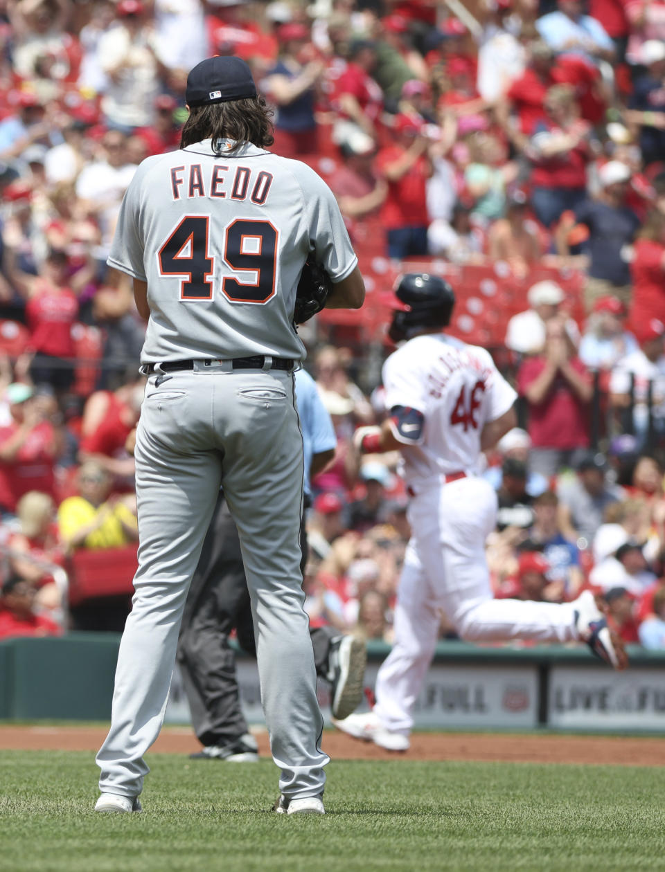 Detroit Tigers starting pitcher Alex Faedo (49) regroups as St. Louis Cardinals' Paul Goldschmidt circles the bases after hitting a solo home run in the first inning of a baseball game, Sunday, May 7, 2023, in St. Louis. (AP Photo/Tom Gannam)