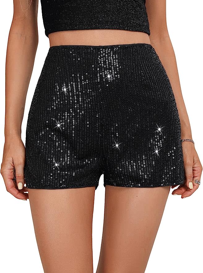 model wearing black sequin shorts with black crop top