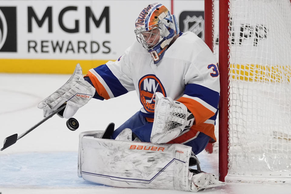 New York Islanders goaltender Ilya Sorokin (30) blocks a shot by the Vegas Golden Knights during the second period of an NHL hockey game Saturday, Jan. 6, 2024, in Las Vegas. (AP Photo/John Locher)