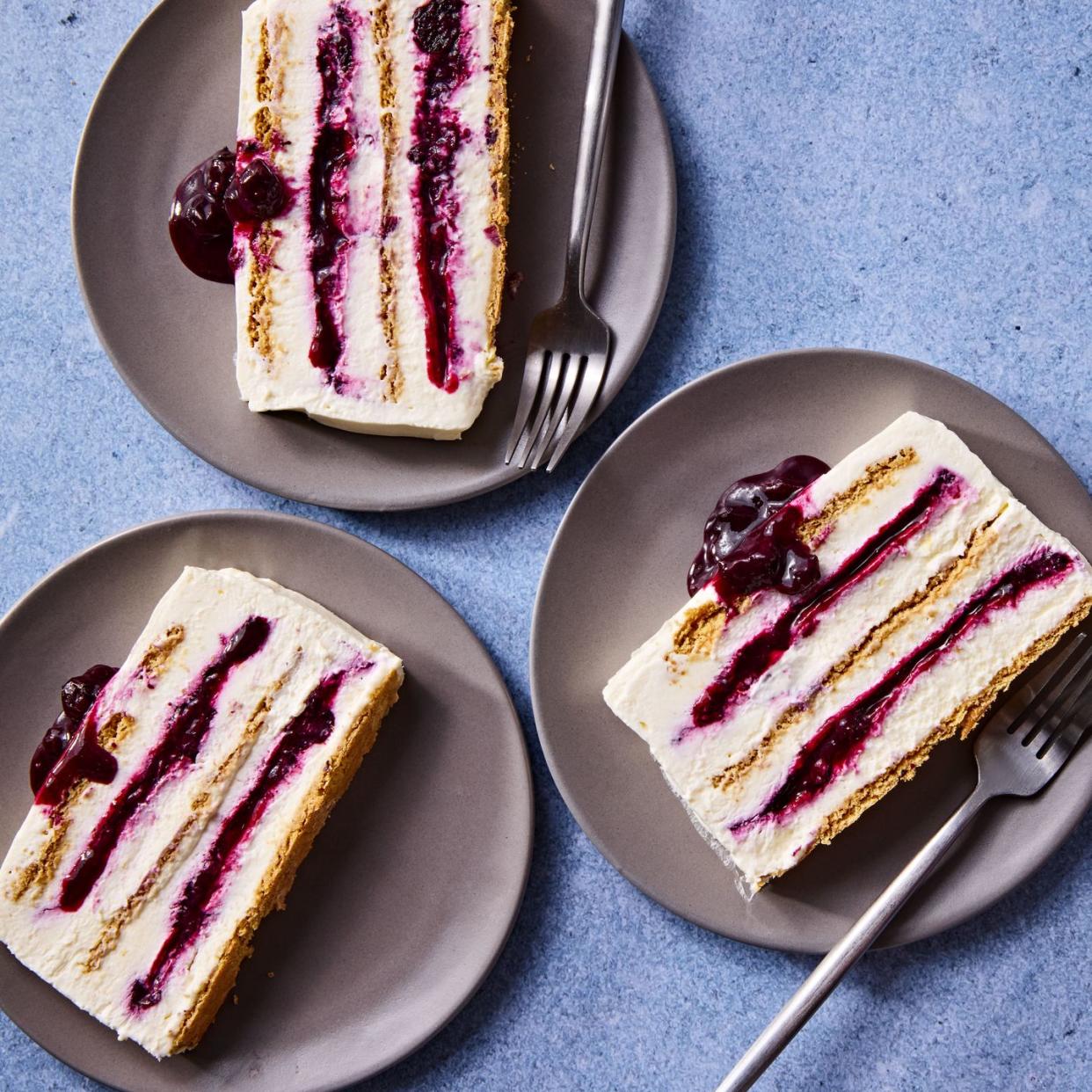 slices of blueberry cheesecake icebox cake on plates