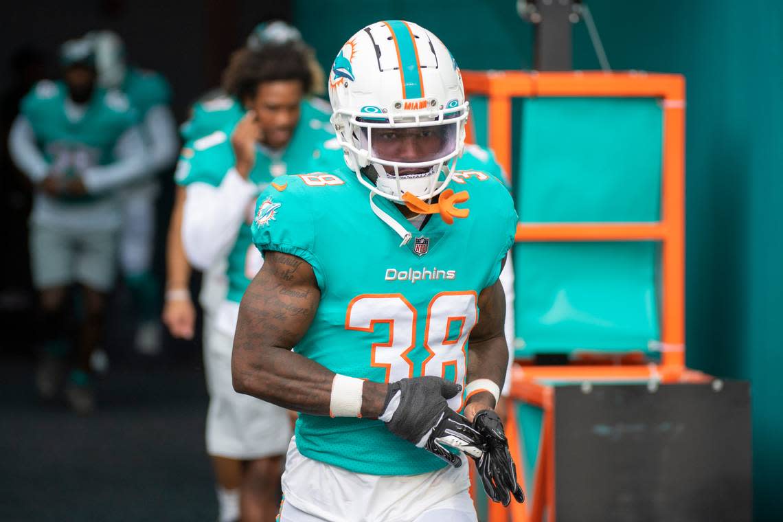 Miami Dolphins cornerback Kader Kohou (38) walks onto the field before an NFL football game against the Las Vegas Raiders, Saturday, Aug. 20, 2022, in Miami Gardens, Fla. (AP Photo/Doug Murray)