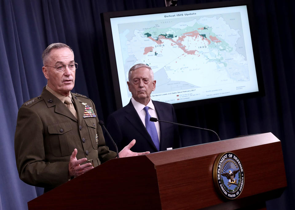 Chairman of the Joint Chiefs of Staff Marine Gen. Joseph F. Dunford Jr., left, and U.S. Secretary of Defense Jim Mattisanswer questions during a Pentagon briefing, May 19, 2017. (Photo: Win McNamee/Getty Images)