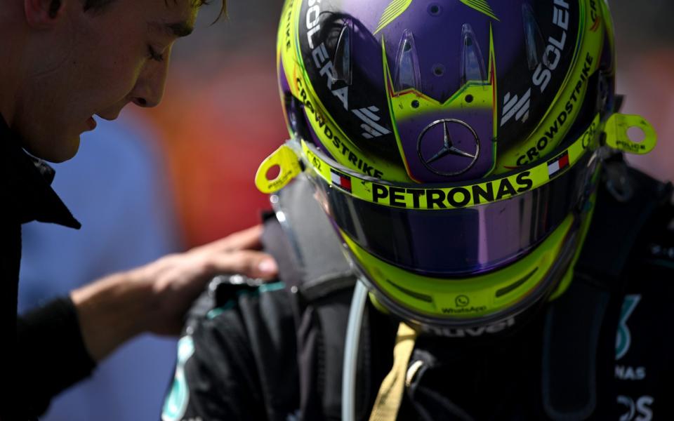 Second placed Lewis Hamilton of Great Britain and Mercedes talks with Race winner George Russell of Great Britain and Mercedes in parc ferme during the F1 Grand Prix of Belgium at Circuit de Spa-Francorchamps on July 28, 2024 in Spa, Belgium