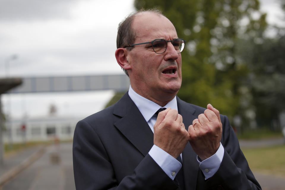 France's new prime minister Jean Castex gives a press conference after he made his first outing in the new job in X-FAB, a semiconductor factory that received extensive government aid to withstand the virus lockdown on its activity in Le Coudray Montceaux, near Paris, Saturday, July 4, 2020. His office chose the X-FAB factory because it's seen as an example of European cooperation and innovation, and the kind of company that will be important to pulling France of out of deep recession and reviving its industrial production. (AP Photo/Francois Mori)