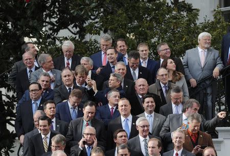 Congressional Republicans gather outside the White House after the U.S. Congress passed sweeping tax overhaul legislation in Washington, U.S., December 20, 2017. REUTERS/Carlos Barria