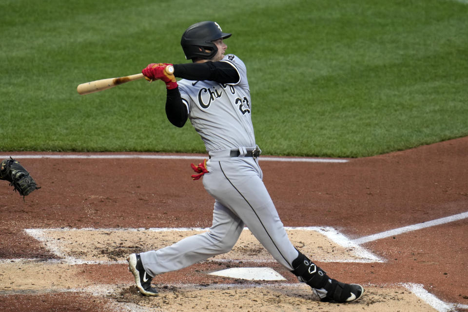 Chicago White Sox's Andrew Benintendi singles off Pittsburgh Pirates starting pitcher Vince Velasquez, driving in a run, during the third inning of a baseball game in Pittsburgh, Saturday, April 8, 2023. (AP Photo/Gene J. Puskar)