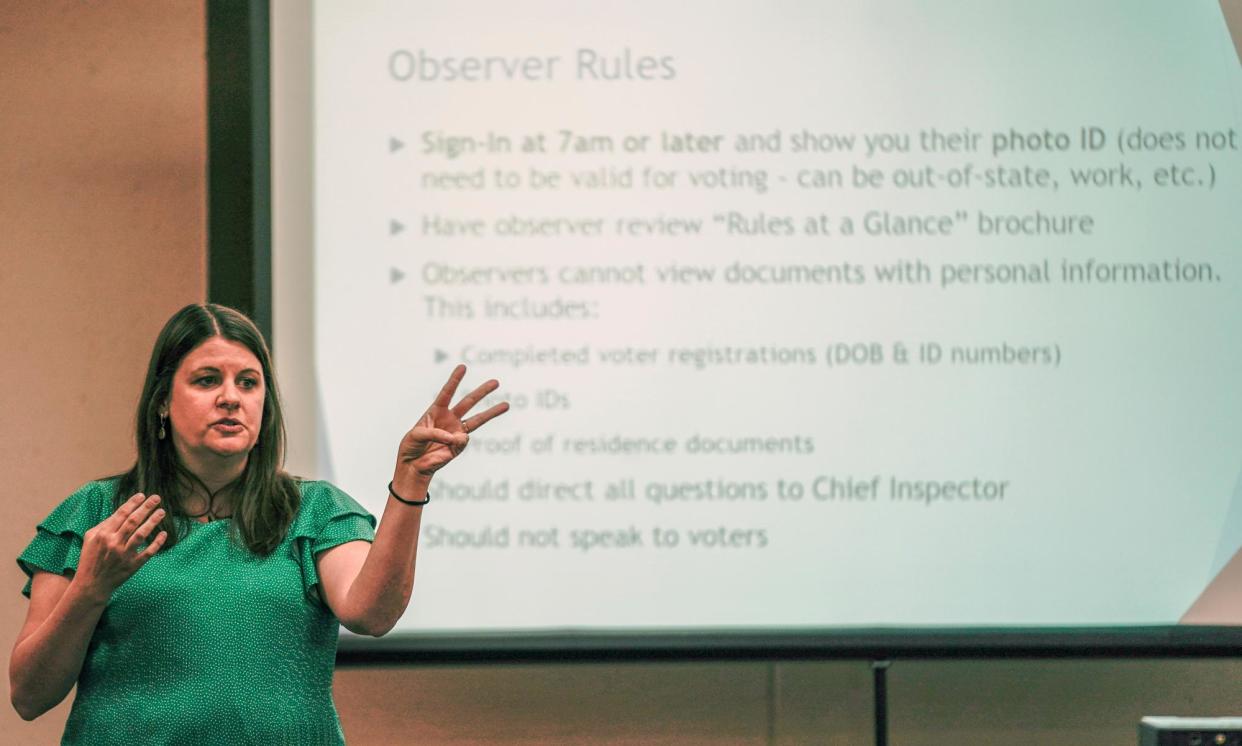 <span>Claire Woodall, the then executive director of the City of Milwaukee election commission, teaches a class to poll workers in October 2022 in Milwaukee.</span><span>Photograph: Morry Gash/AP</span>