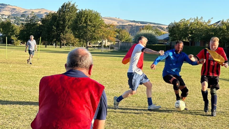 Ataçocuğu plays soccer with his walking football club at Halswell Domain on February 21, 2024. He says it's the only time his flashbacks subside. - Alaa Elassar/CNN