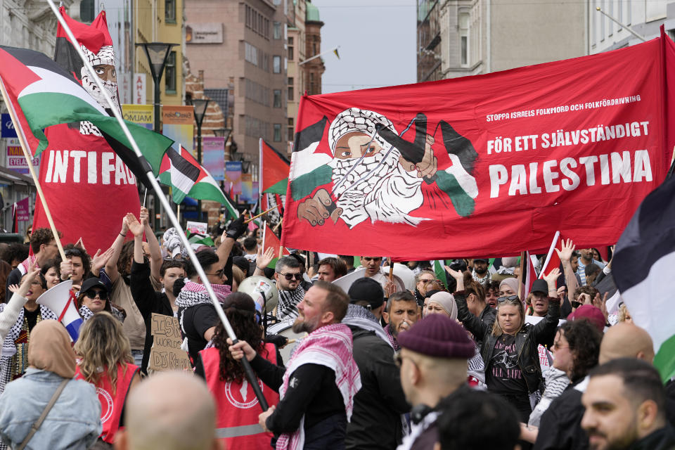 People carry a banner with the words in Swedish "For an independent Palestine" during a Pro-Palestinian demonstration for excluding Israel from Eurovision ahead of the second semi-final at the Eurovision Song Contest in Malmo, Sweden, Thursday, May 9, 2024. (AP Photo/Martin Meissner)