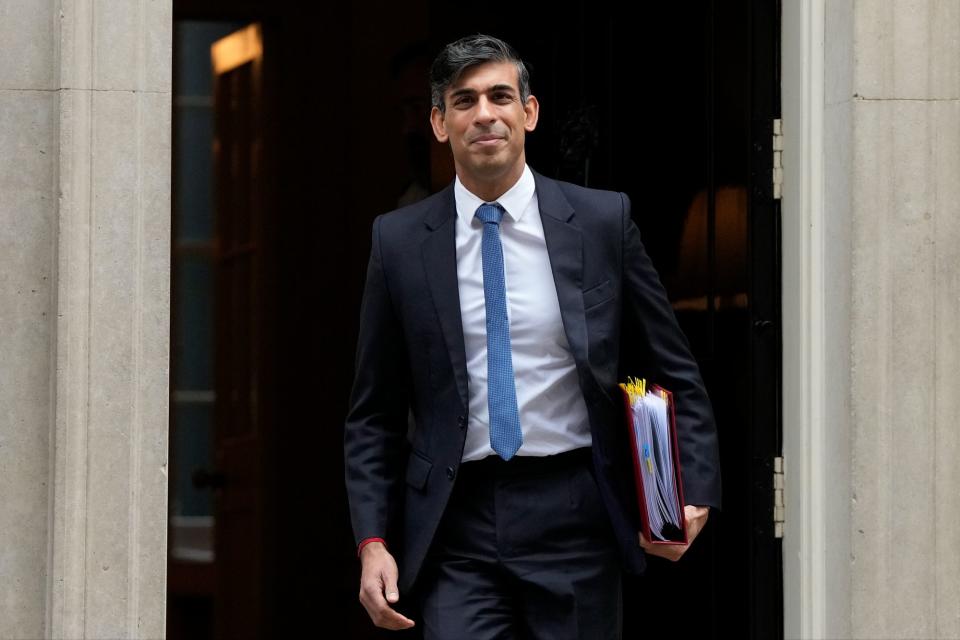 Rishi Sunak leaves No10 for PMQs (AP)