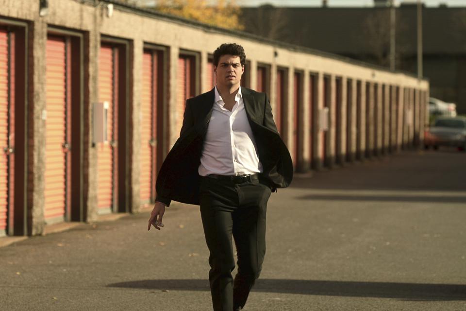 This image released by Netflix shows Noah Centineo as Owen Hendricks in a scene from the series "The Recruit." (Netflix via AP)