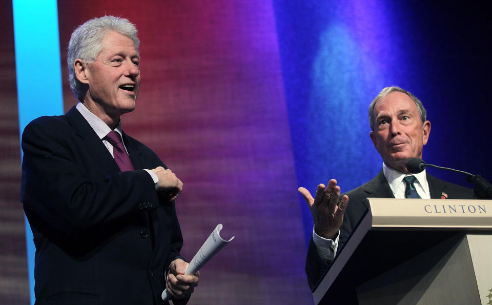 Michael Bloomberg speaks at the Clinton Global Initiative in 2010 as former President Bill Clinton looks on. Clinton welcomed billionaires into the Democratic Party. (Photo: Mario Tama/Getty Images)