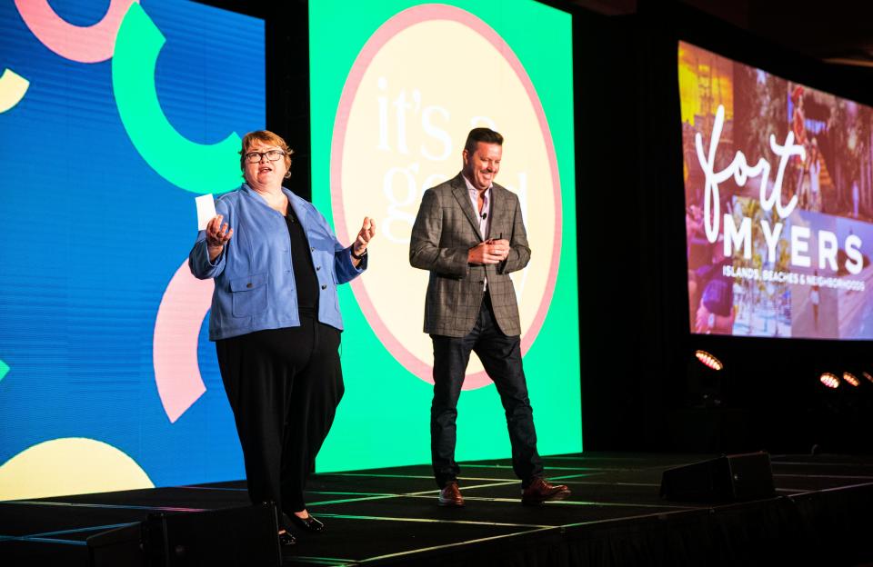 Tamara Pigott, the executive director of the Lee County Visitors and Convention Bureau and Stuart Colovin of MMGY unveil a new marketing plan at the tourism outlook convention at Marriott Sanibel Harbour Resort & Spa in Fort Myers.