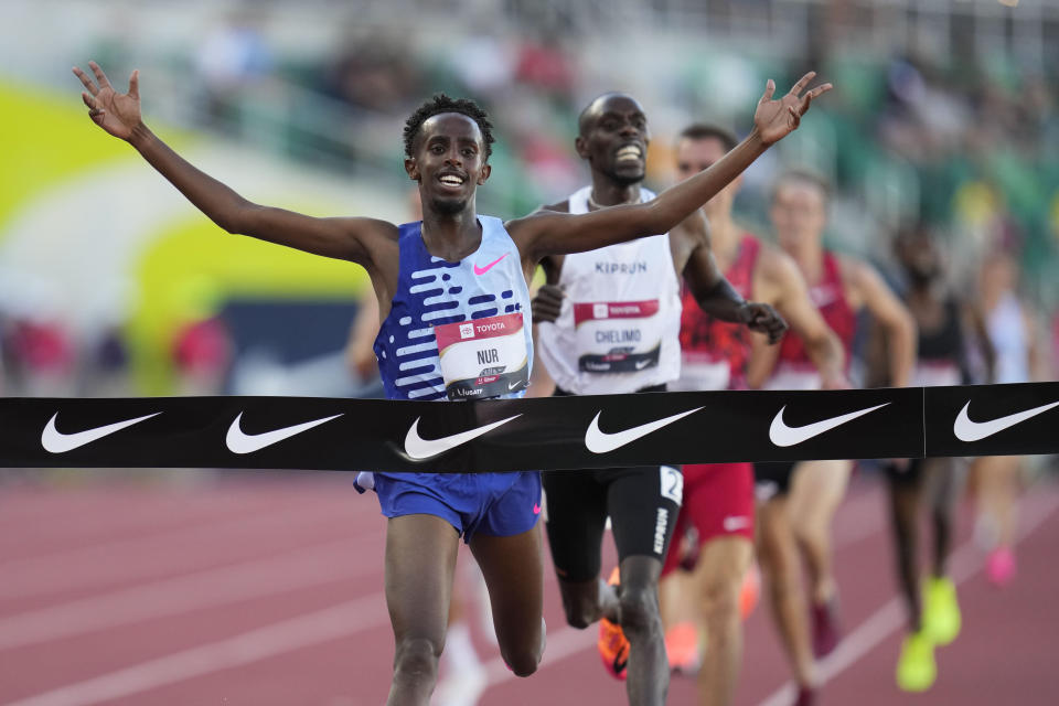 Abdihamid Nur wins the men's 5000 meter final during the U.S. track and field championships in Eugene, Ore., Sunday, July 9, 2023. (AP Photo/Ashley Landis)