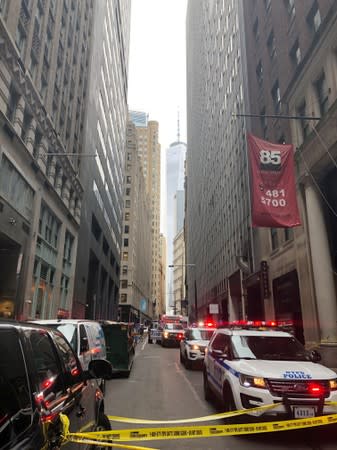 New York police shut off John Street near the Fulton Street subway station as police said they were investigating two suspicious packages in Manhattan