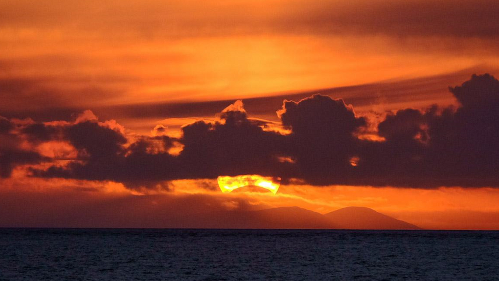 A partial solar eclipse glimpsed in Gairloch, the Highlands of Scotland