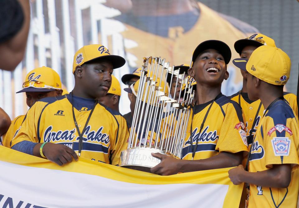 The Jackie Robinson West Little League baseball team participates in a rally in Chicago on Aug. 27, 2014.