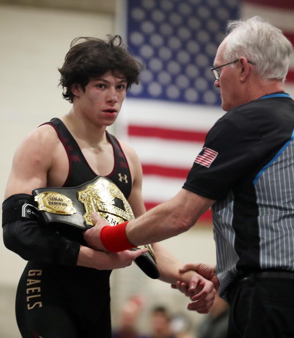 Iona's Justin Shay and Iona's Jude Bellantoni wrestle in the 138-pound weight class during the Westchester County wrestling championship at Yonkers High School Jan. 20, 2024.