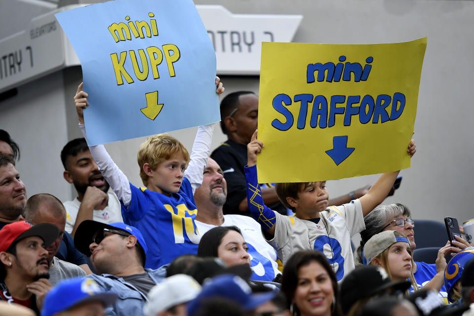 INGLEWOOD, CALIFORNIA – SEPTEMBER 18: Los Angeles Rams fans hold up signs in the second half of the game against the Atlanta Falcons at SoFi Stadium on September 18, 2022 in Inglewood, California. (Photo by Kevork Djansezian/Getty Images)