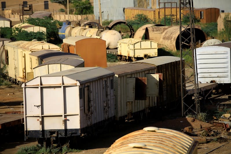 Vandalised cargo wagons are seen at the Atbara railway station in Nile State