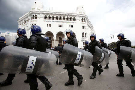 Police officers deploy during a protest against the appointment of interim president, Abdelkader Bensalah and demanding radical changes to the political system in Algiers, Algeria April 10, 2019. REUTERS/Ramzi Boudina