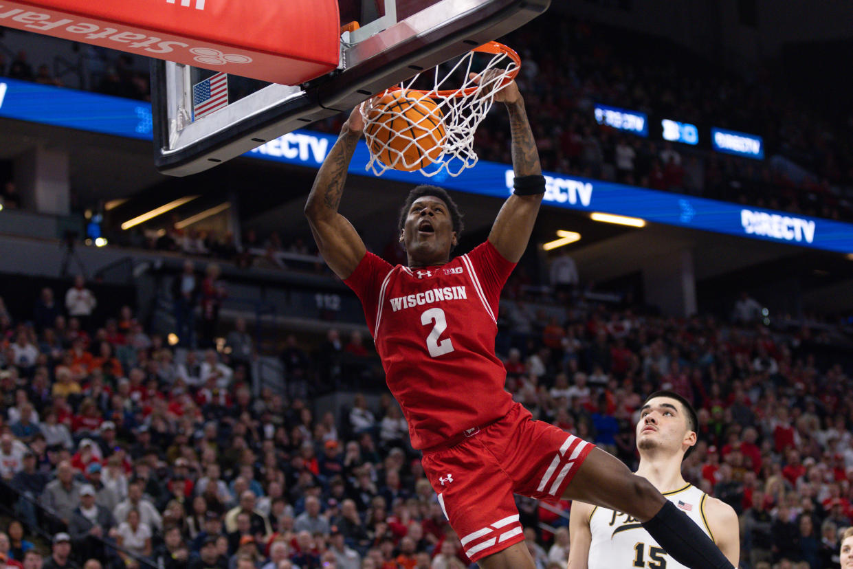 MINNEAPOLIS, MN - MARCH 16: Wisconsin Badgers guard AJ Storr (2) dunks the ball during overtime of a Big Ten Men's Basketball Tournament semi finals game between the Purdue Boilermakers and Wisconsin Badgers on March 16, 2024, at the the Target Center in Minneapolis, MN. (Photo by Bailey Hillesheim/Icon Sportswire via Getty Images)