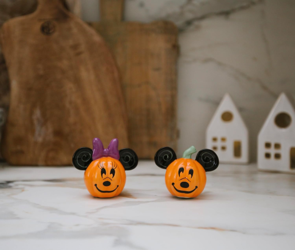 <p><a href="https://www.amazon.com/Disney-Olantern-Housewarming-Official-Licensee/dp/B0CFYRFH8N/ref=sr_1_55?tag=syn-yahoo-20&ascsubtag=%5Bartid%7C10070.g.61170509%5Bsrc%7Cyahoo-us" rel="nofollow noopener" target="_blank" data-ylk="slk:Shop Now;elm:context_link;itc:0;sec:content-canvas" class="link ">Shop Now</a></p><p>Mickey and Minnie Mouse Salt and Pepper Shakers</p><p>$17.99</p>