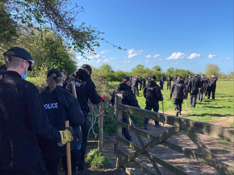 Police officers searching a field off Ratling Road in Aylesham, Kent, as the murder investigation into the death of PCSO Julia James continues (Michael Drummond/PA)