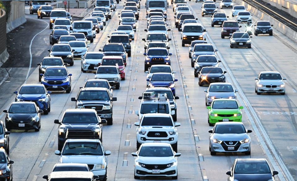 Cars make their way in traffic on a Los Angeles freeway on January 25, 2024.