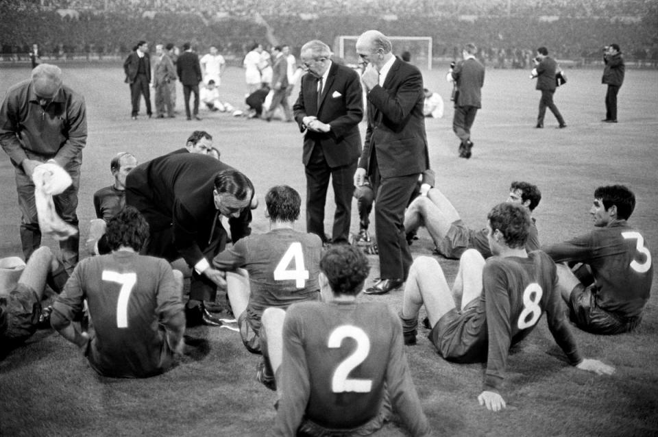 Wales manager Jimmy Murphy, left, was a key figure at Manchester United for many years and is pictured with Matt Busby trying to inspire their players before the start of extra time in their 1968 European Cup final victory over Benfica at Wembley (PA) (PA Archive)