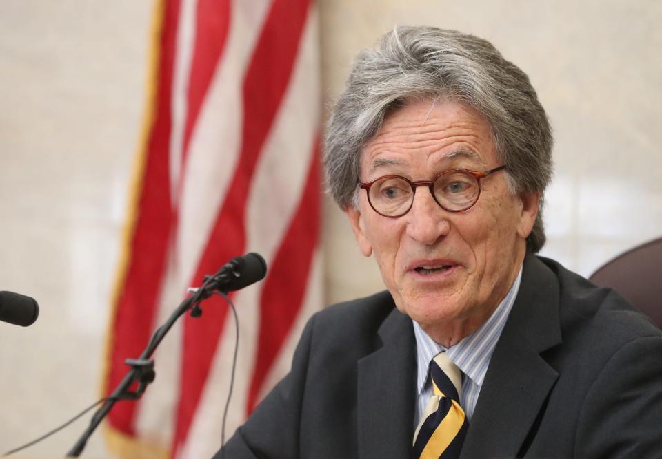 Visiting Judge Edward O'Farrell addresses the court before giving the verdict in bench trial of former state Rep. Bob Young in Barberton Municipal Court on Thursday. Young was found guilty of domestic violence and acquitted of assault.