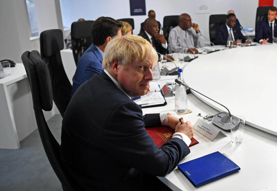 BIARRITZ, FRANCE - AUGUST 24: British Prime Minister Boris Johnson attends a working session on "G7 Partnership with Africa" during the G7 summit on August 24, 2019 in Biarritz, France. The French southwestern seaside resort of Biarritz is hosting the 45th G7 summit from August 24 to 26. High on the agenda will be the climate emergency, the US-China trade war, Britain's departure from the EU, and emergency talks on the Amazon wildfire crisis. (Photo by Dylan Martinez - Pool/Getty Images)