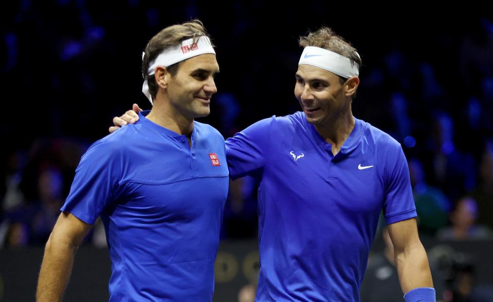 Roger Federer and Rafael Nadal of Team Europe interact during the doubles match between Jack Sock and Frances Tiafoe of Team World and Roger Federer and Rafael Nadal of Team Europe during Day One of the Laver Cup at The O2 Arena.