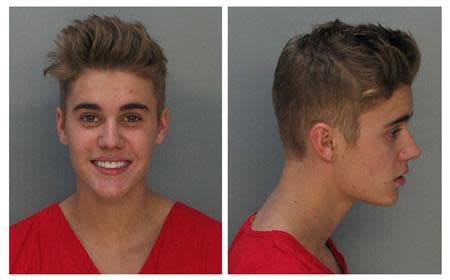 Canadian teen pop singer Justin Bieber is shown in this combo of booking photos provided by the Miami-Dade Corrections and Rehabilitation Department in Miami, Florida January 23, 2014. REUTERS/Miami-Dade Corrections and Rehabilitation Department/Handout via Reuters