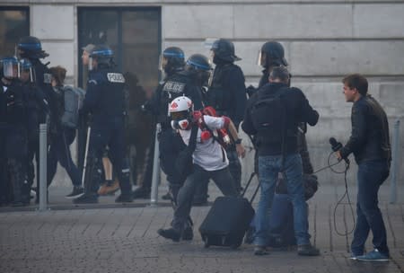 Protesters attend a demonstration on Act 45 (the 45th consecutive national protest on Saturday) of the yellow vests movement in Paris