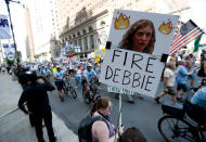 <p>A supporters of Sen. Bernie Sanders, I-Vt., holds up a sign call calling for Debbie Wasserman Schultz, chairwoman of the Democratic National Committee to be fired, Sunday, July 24, 2016, in Philadelphia. The Democratic National Convention starts Monday. (AP Photo/Alex Brandon)</p>