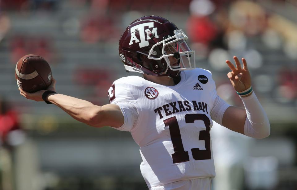 Texas A&M quarterback Haynes King warms up before his team's game with Alabama in 2020 at Bryant-Denny Stadium.