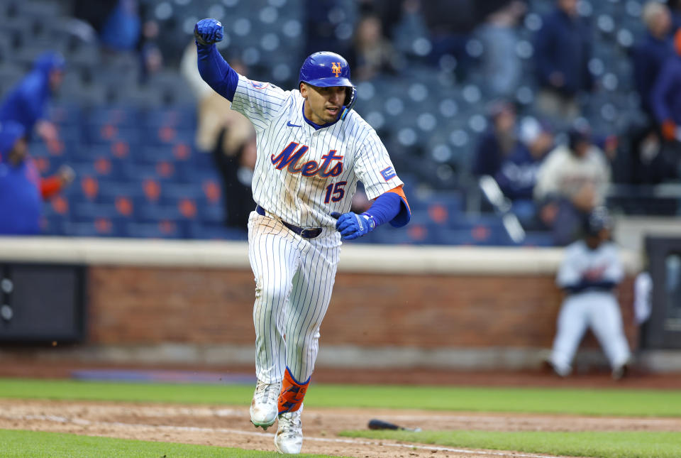 New York Mets' Tyrone Taylor runs to first base after hitting a walkoff single against the Detroit Tigers during the ninth inning in the second game of a baseball doubleheader, Thursday, April 4, 2024, in New York. (AP Photo/Noah K. Murray)