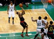 Apr 22, 2016; Boston, MA, USA; Atlanta Hawks guard Jeff Teague (0) shoots against the Boston Celtics during the fourth quarter in game three of the first round of the NBA Playoffs at TD Garden. Mandatory Credit: David Butler II-USA TODAY Sports