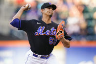 New York Mets' Carlos Carrasco pitches during the first inning of a baseball game against the Miami Marlins, Friday, June 17, 2022, in New York. (AP Photo/Frank Franklin II)