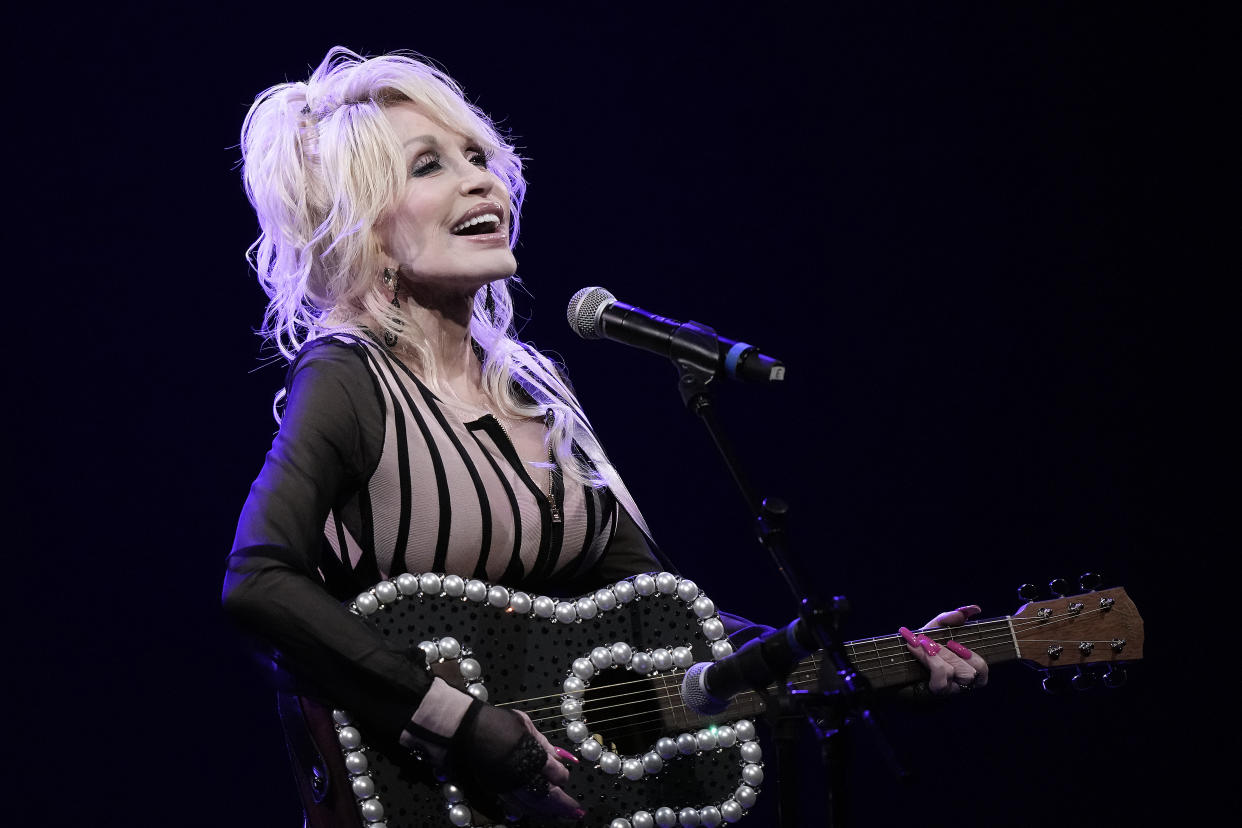 Dolly Parton performs during an event celebrating the Kansas statewide expansion of Dolly Parton's Imagination Library Monday, Aug. 14, 2023, in Overland Park, Kan. (AP Photo/Charlie Riedel)