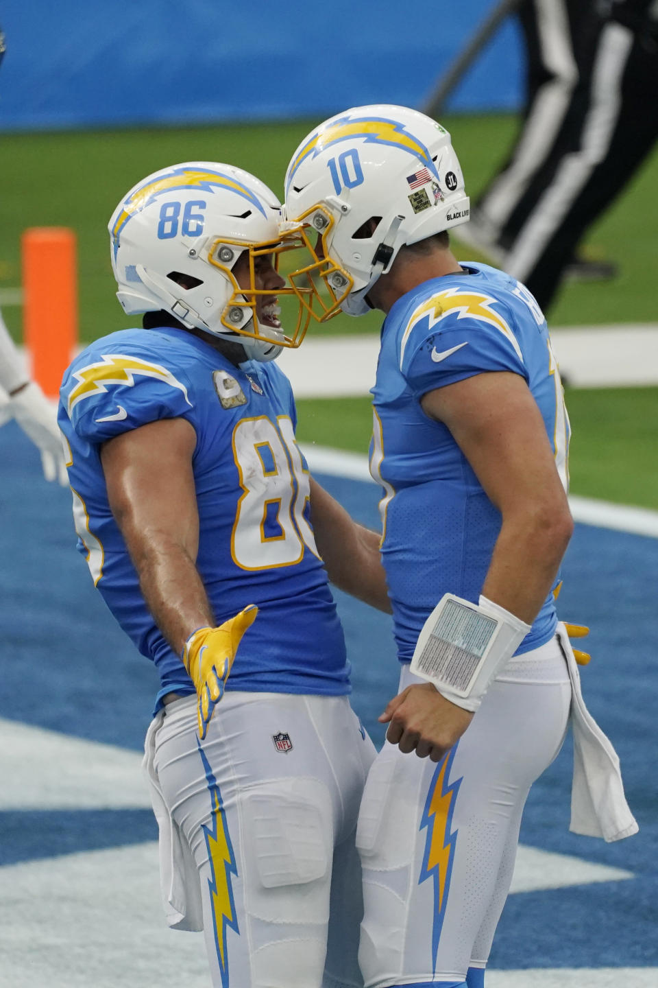 Los Angeles Chargers tight end Hunter Henry, left, celebrates his touchdown catch with Justin Herbert (10) during the first half of an NFL football game against the New York Jets Sunday, Nov. 22, 2020, in Inglewood, Calif. (AP Photo/Jae C. Hong)