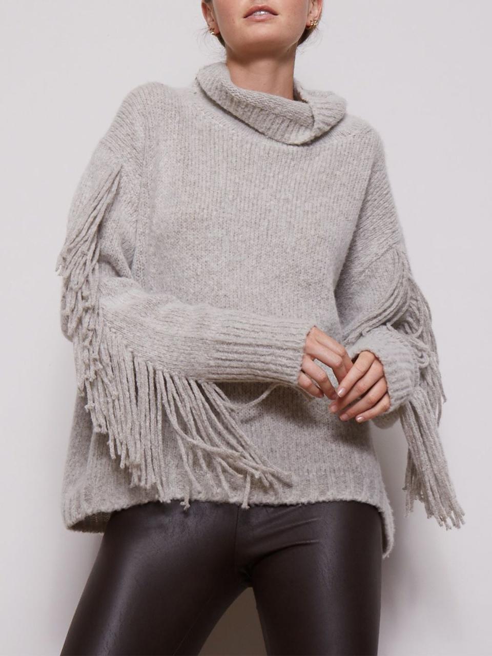 <p><a href="https://go.redirectingat.com?id=74968X1596630&url=https%3A%2F%2Fwww.brochuwalker.com%2Fcollections%2Fsweaters%2Fproducts%2Fdeaville-fringe-sweater-light-grey&sref=https%3A%2F%2Fwww.townandcountrymag.com%2Fstyle%2Ffashion-trends%2Fg22815575%2Fpretty-christmas-sweaters%2F" rel="nofollow noopener" target="_blank" data-ylk="slk:Shop Now;elm:context_link;itc:0;sec:content-canvas" class="link ">Shop Now</a></p><p>The Deaville Fringe Pullover</p><p>brochuwalker.com</p><p>$598.00</p>