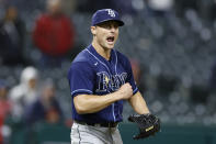 Tampa Bay Rays relief pitcher Calvin Faucher celebrates a 6-5 win against the Cleveland Guardians in baseball game, Tuesday, Sept. 27, 2022, in Cleveland. (AP Photo/Ron Schwane)